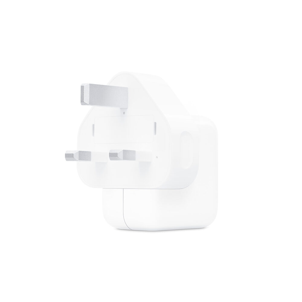 Apple 12W UK Adapter connected to a Lightning cable, charging an iPhone.